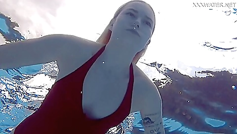 Busty milf with a tattooed pussy getting naked in shower