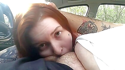 Redheaded bitch with a tattoo sucks her instructor's dick