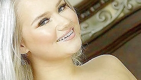 Blonde in a sexy dress is in front of the camera in vr porn