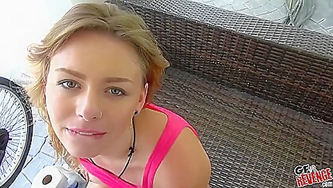 Fishing boat and outdoor beach scene with a tattooed babe