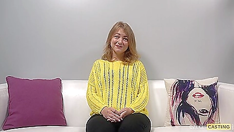 Stunning blonde teen poses for a casting in a studio