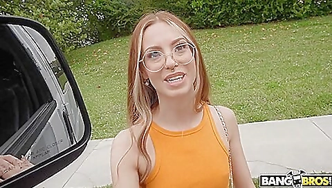 Big-titted redhead with a tattoo fucks in a hardcore video