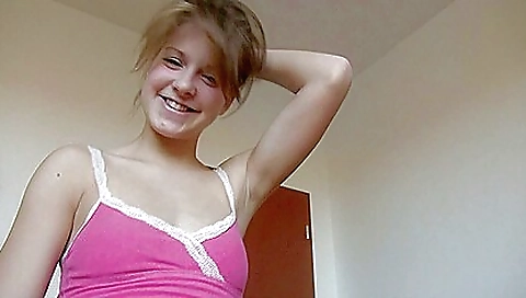 Sexy brunette with nice legs has fun in a solo video