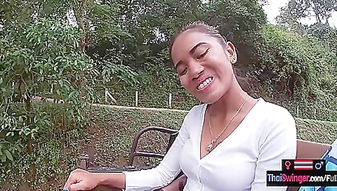 Cute asian teen rides big cock outdoors in Thailand